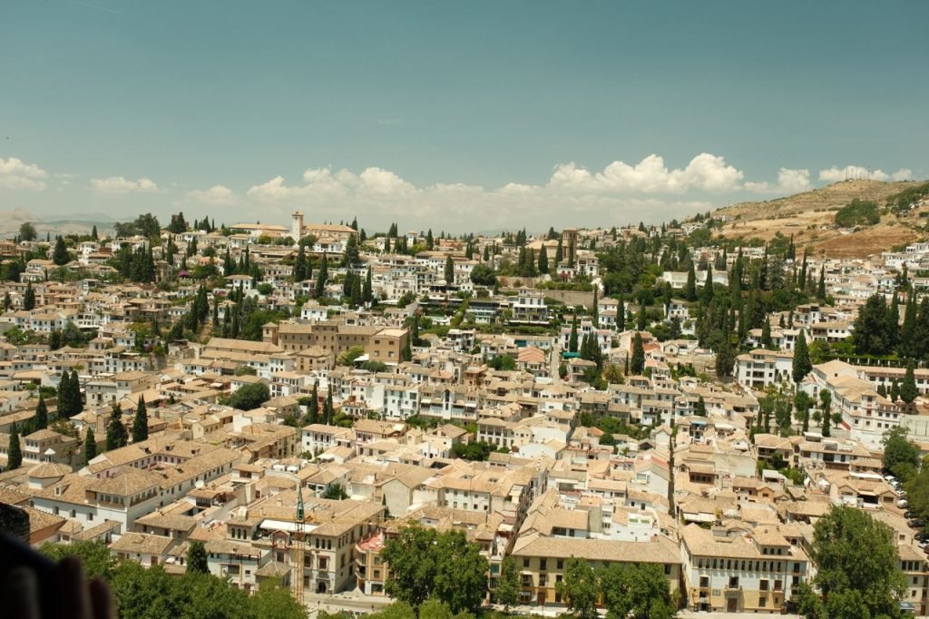 A stunning aerial view of Granadas historic Albayzín district with its distinctive Islamic architecture.